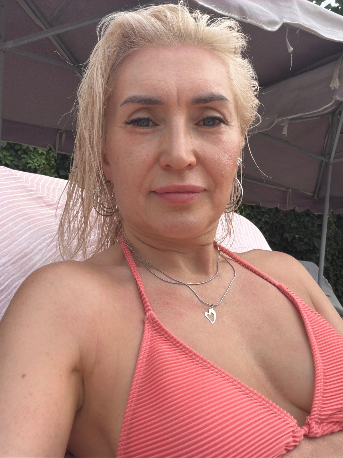 Poolside downtime at a Tashkent resort, July afternoon.
