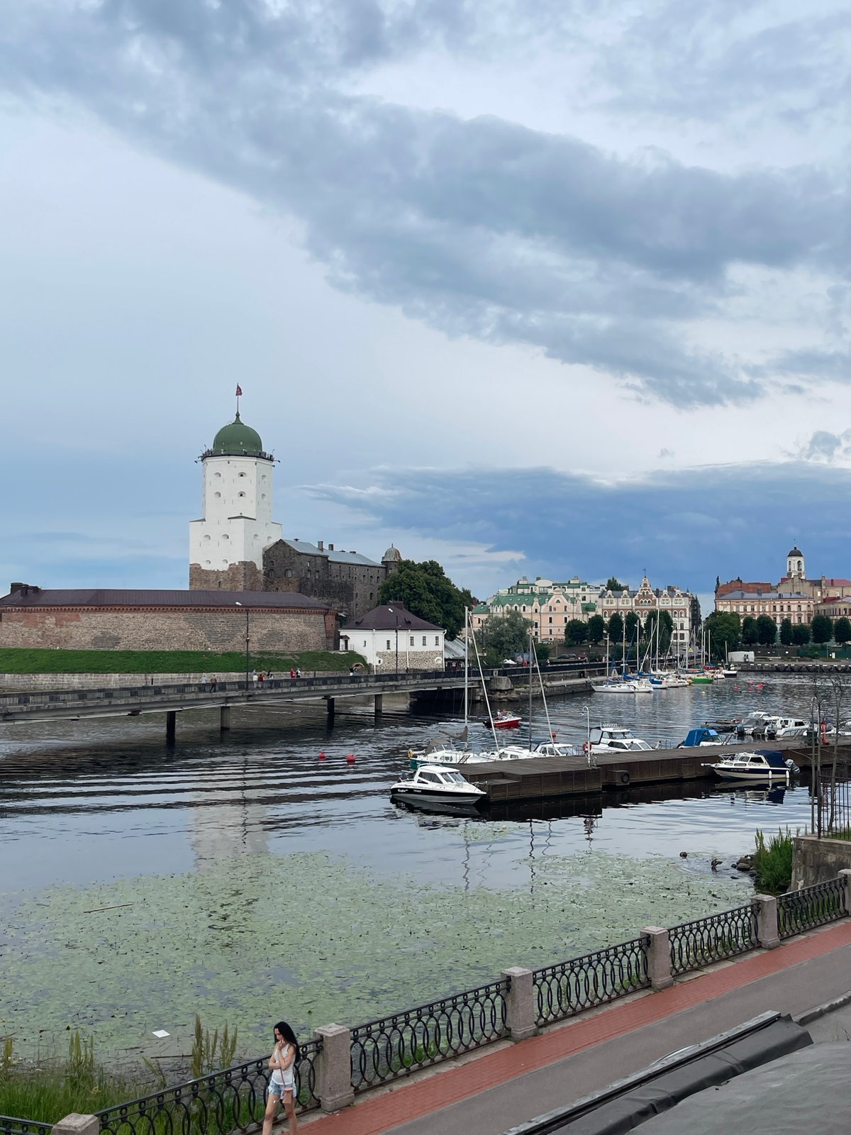 Vyborg Castle and marina on a cloudy summer afternoon
