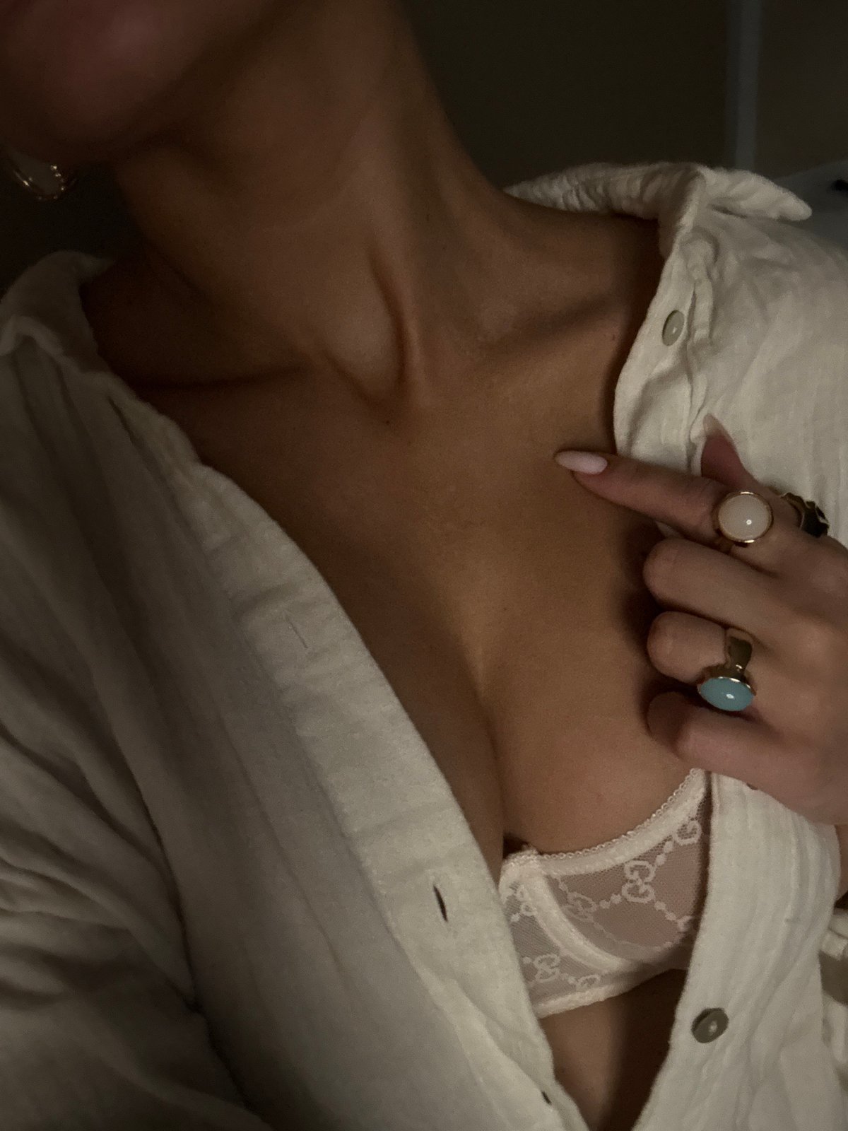 Woman photographed with flower, showing tattoo in Chaikovsky portraits