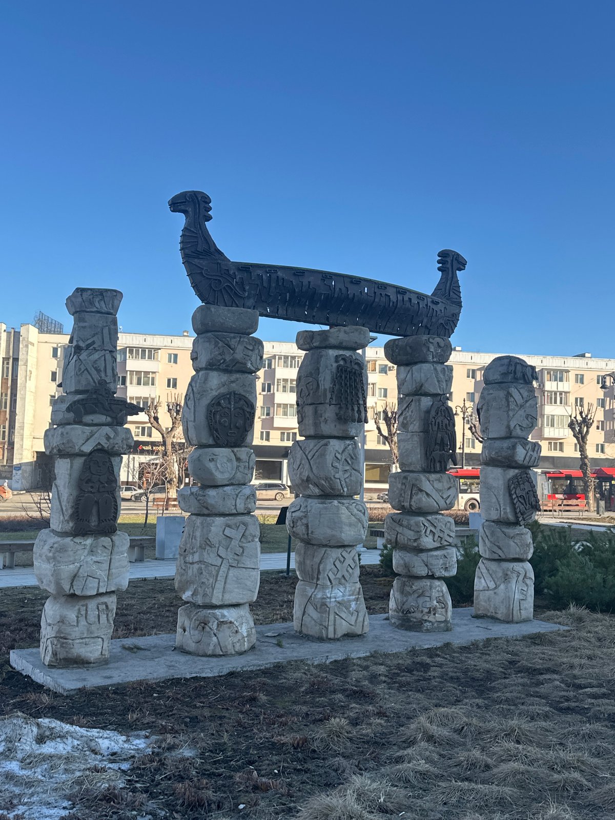 Stone monument with dragon sculpture documented in Perm, Russia