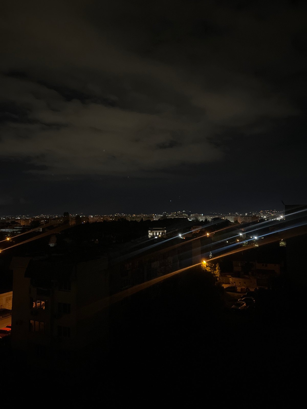 Nighttime cityscape view captured over Sofia, Bulgaria