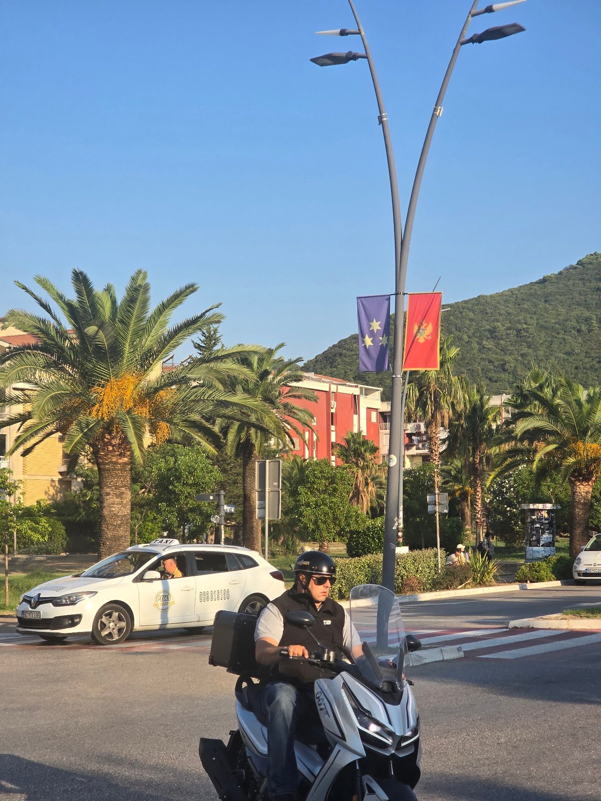 Sunny day along a coastal city's waterfront and streets