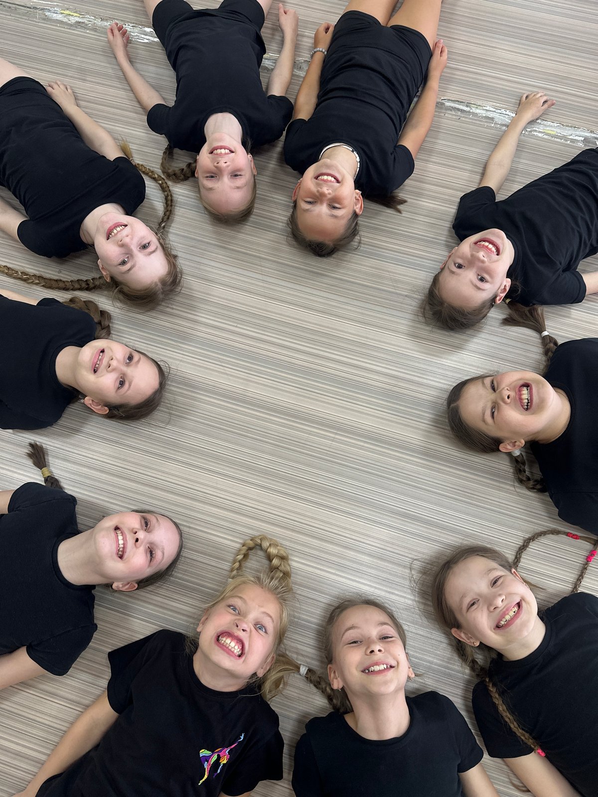Dance students form creative poses during studio session in Votkinsk