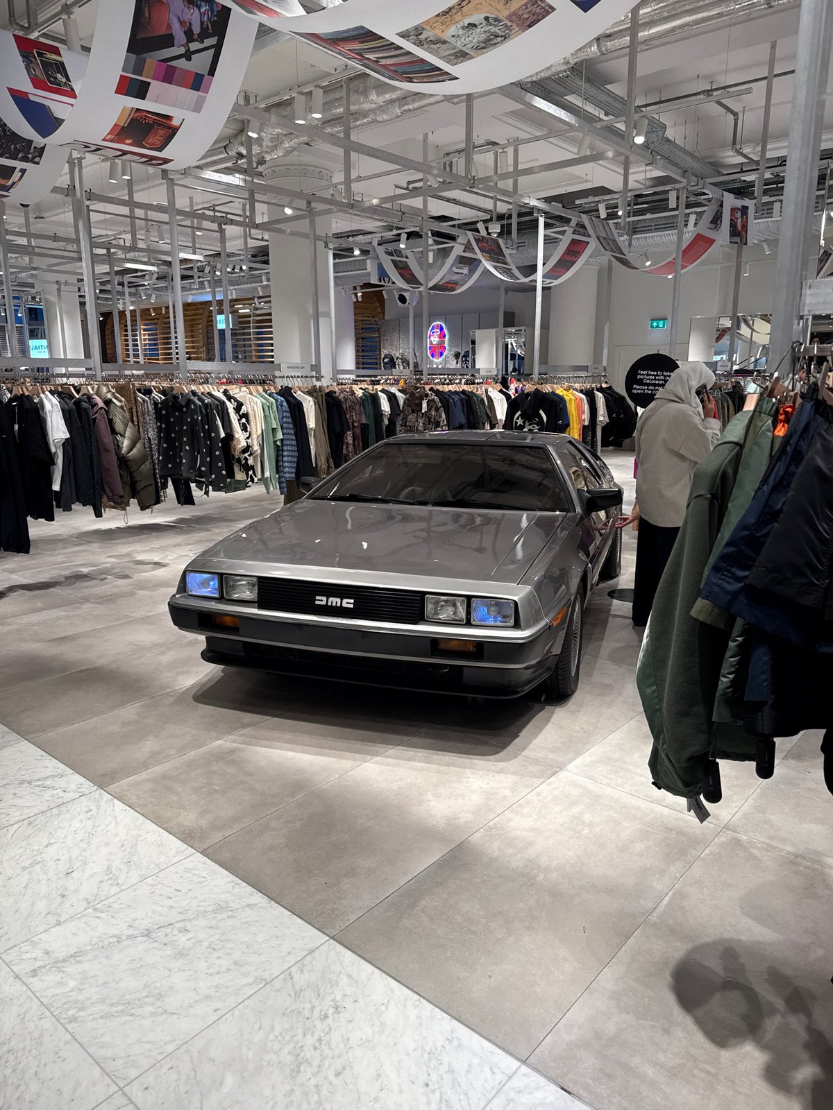 DeLorean sports car displayed inside London retail store