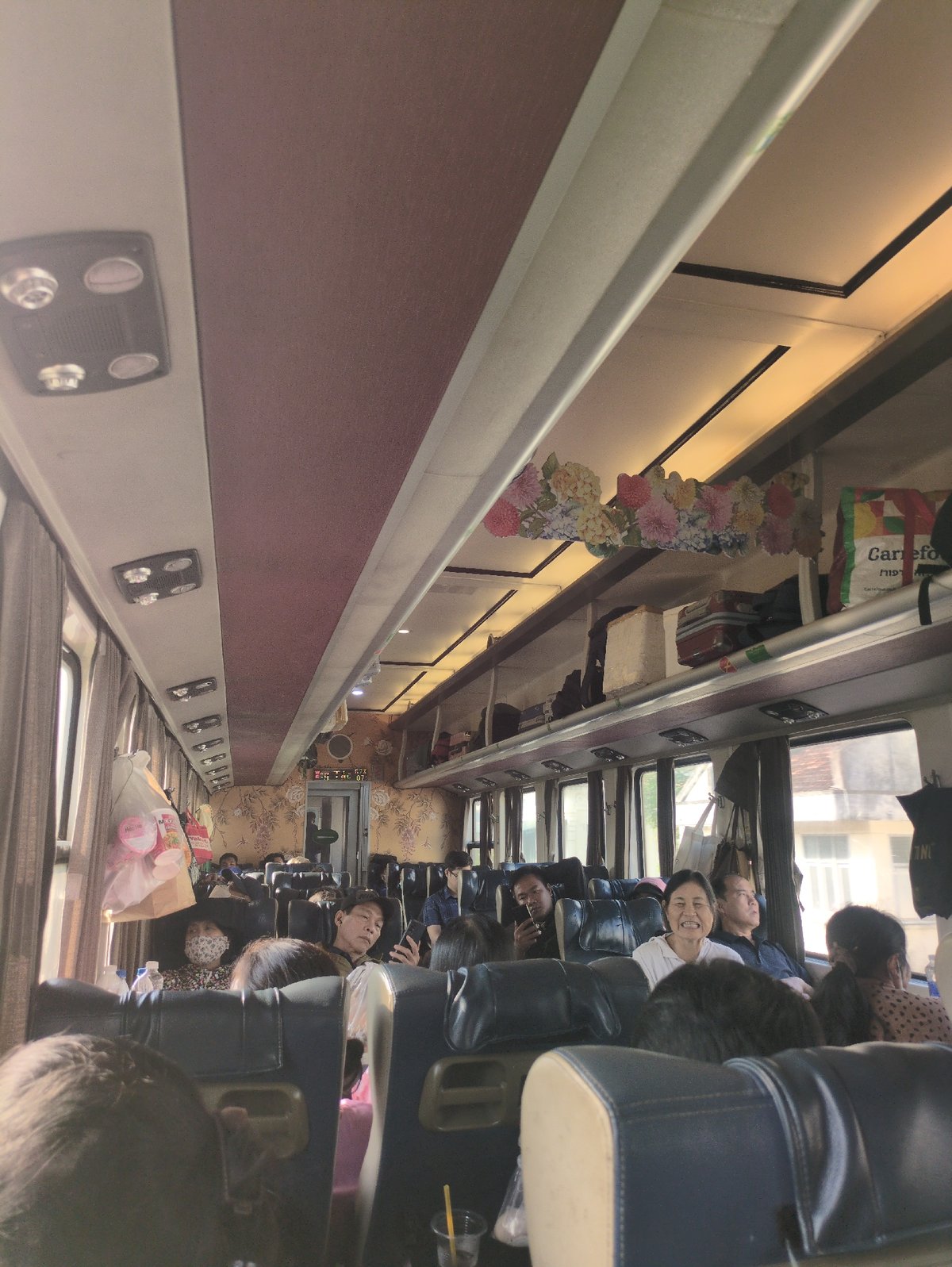 Passenger bus documented in transit through Phú Yên, Vietnam