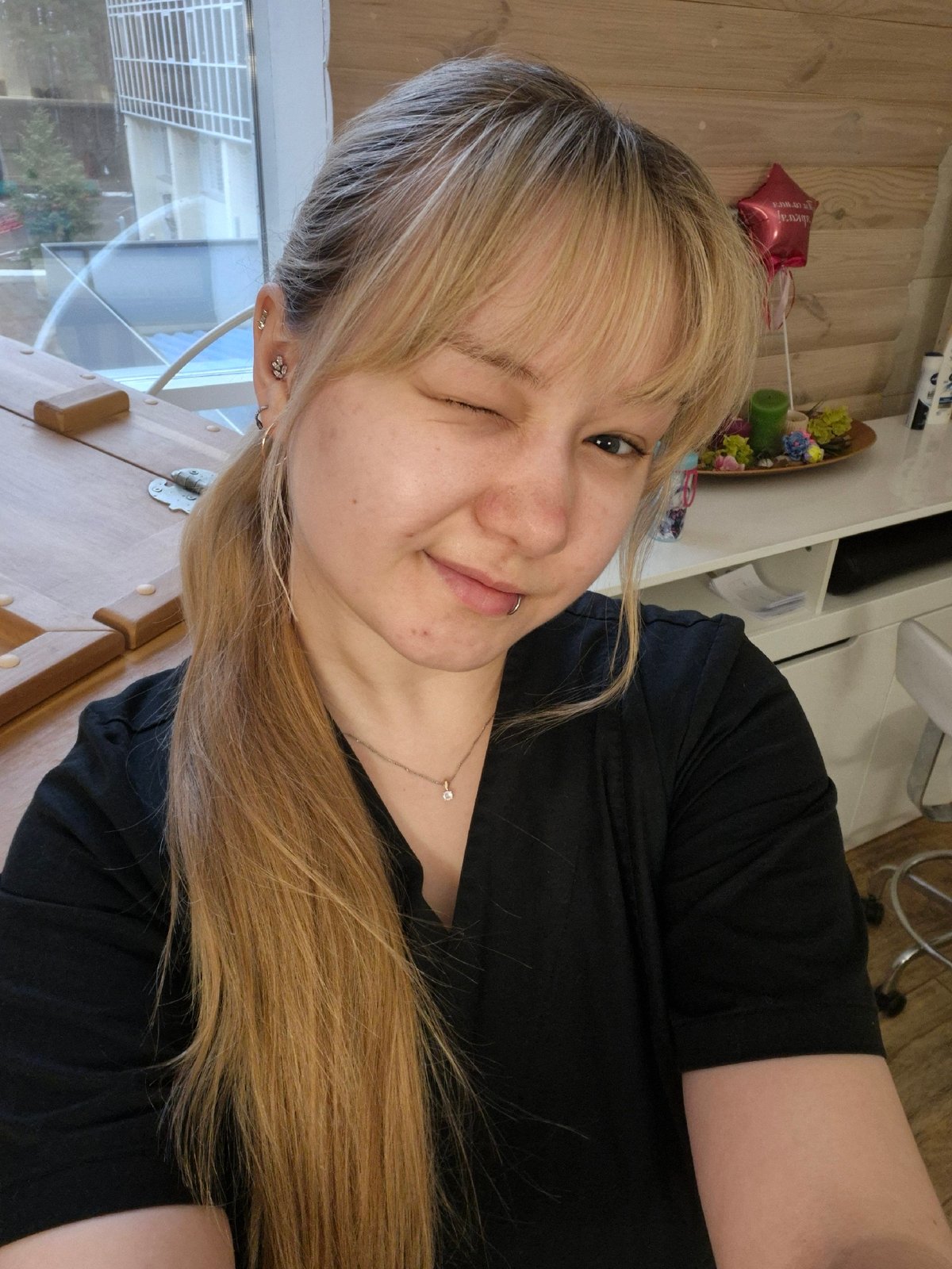 Woman takes morning selfie in Chaikovsky building interior