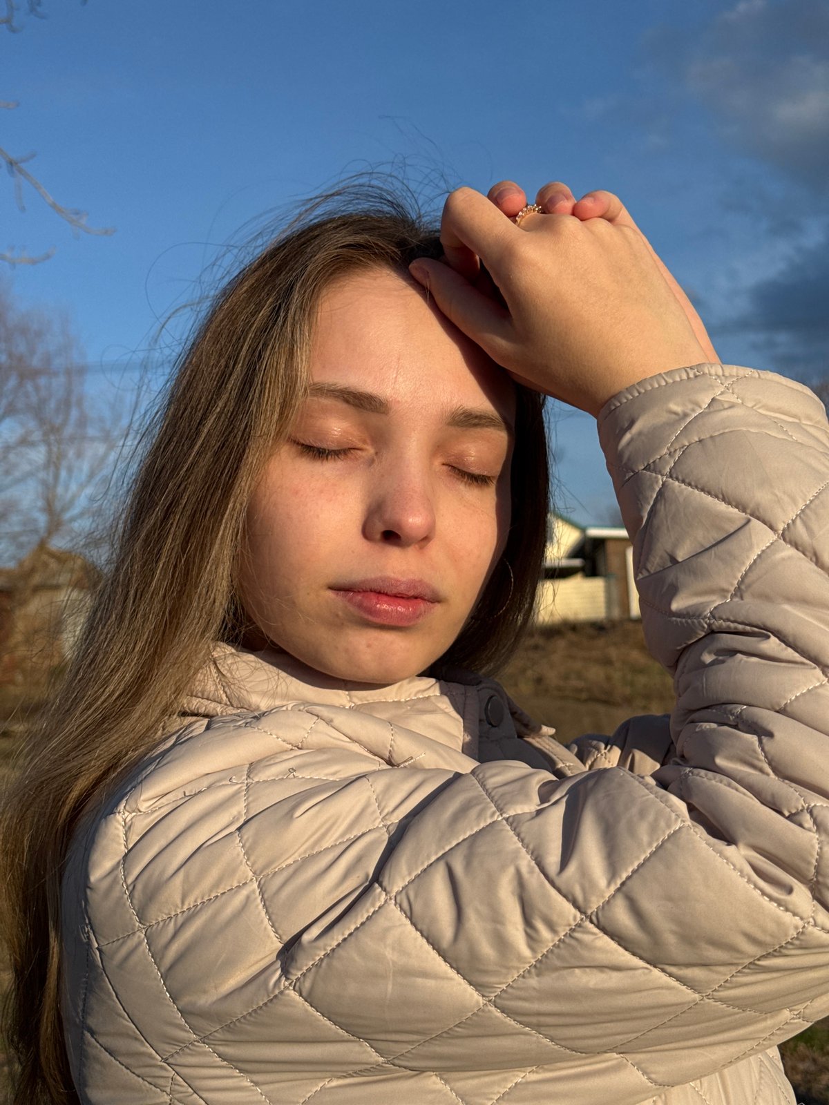 Woman captures selfies and scenic water views in Chaikovsky