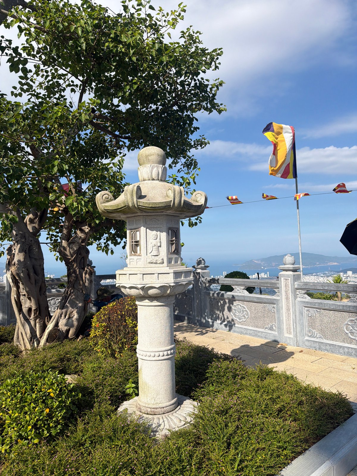 Visitor documents Long Son Pagoda temple complex in Vietnam