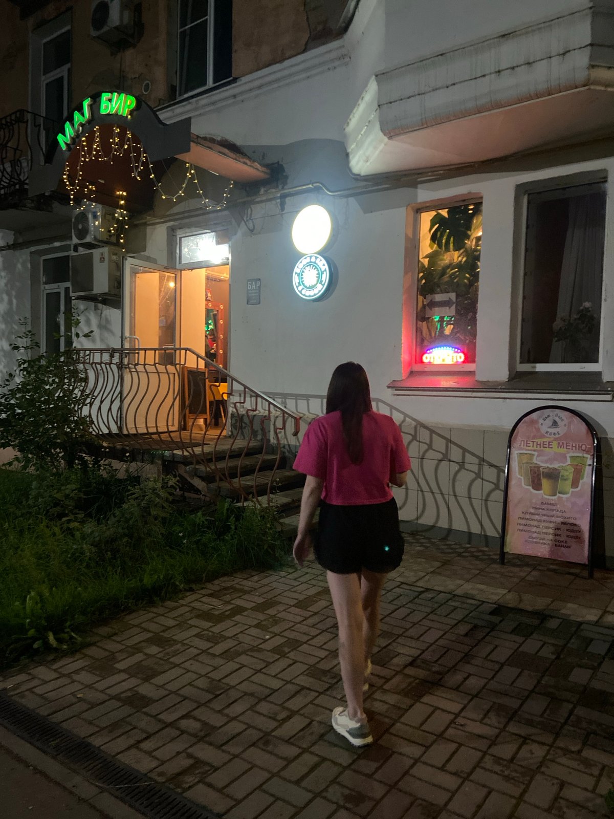 Night out at a neon-lit bar in Votkinsk, Russia