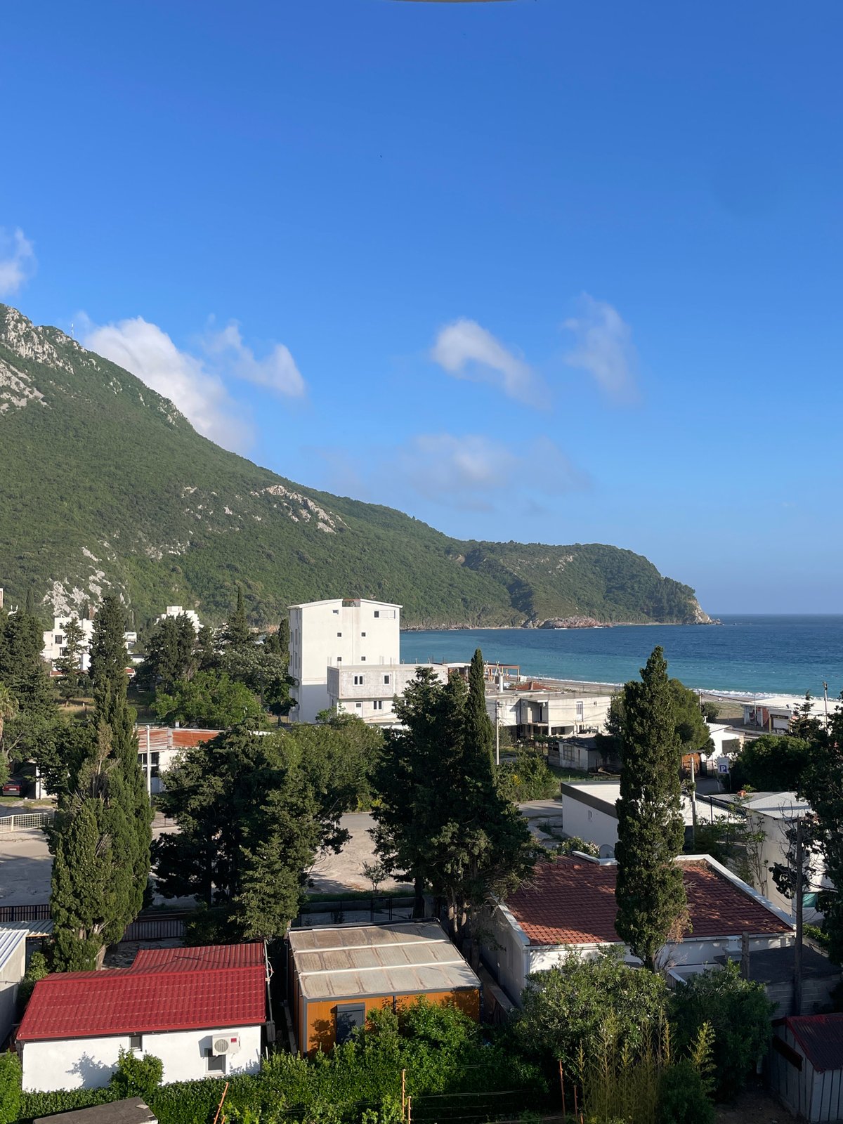 Elevated view captured of Čanj Montenegro coastline and mountains