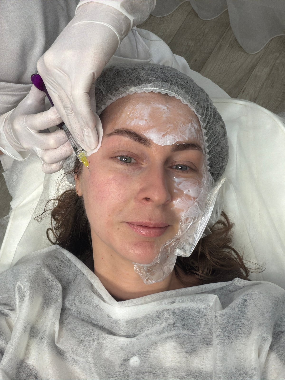 Woman receives facial treatment at Chaikovsky medical facility