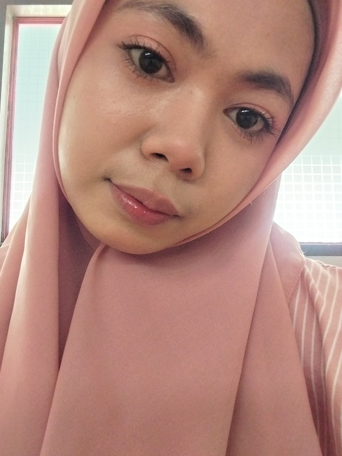 Indoor selfie session in a Tibojong home, July 2026