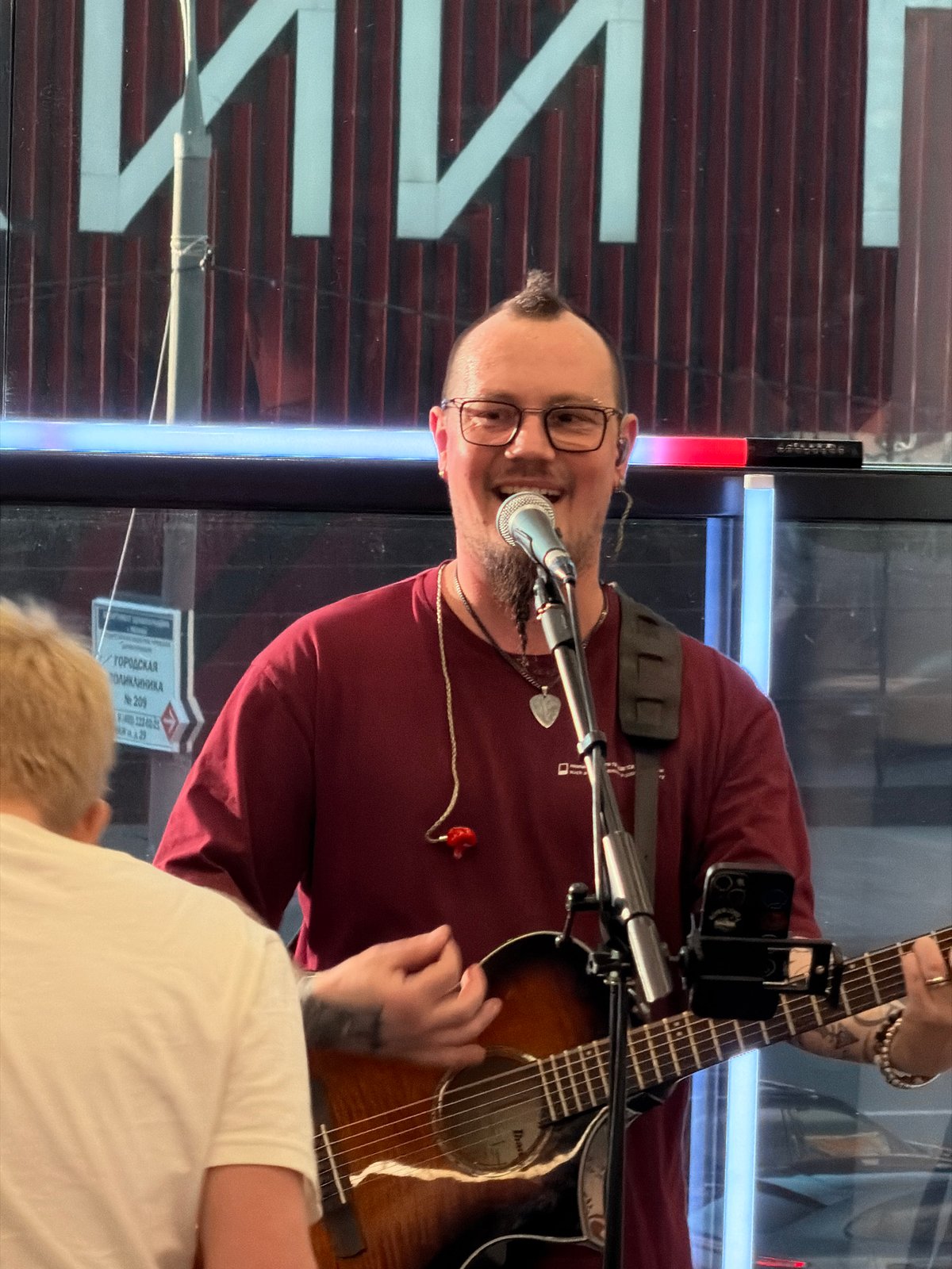 Street musician performs acoustic set in central Moscow