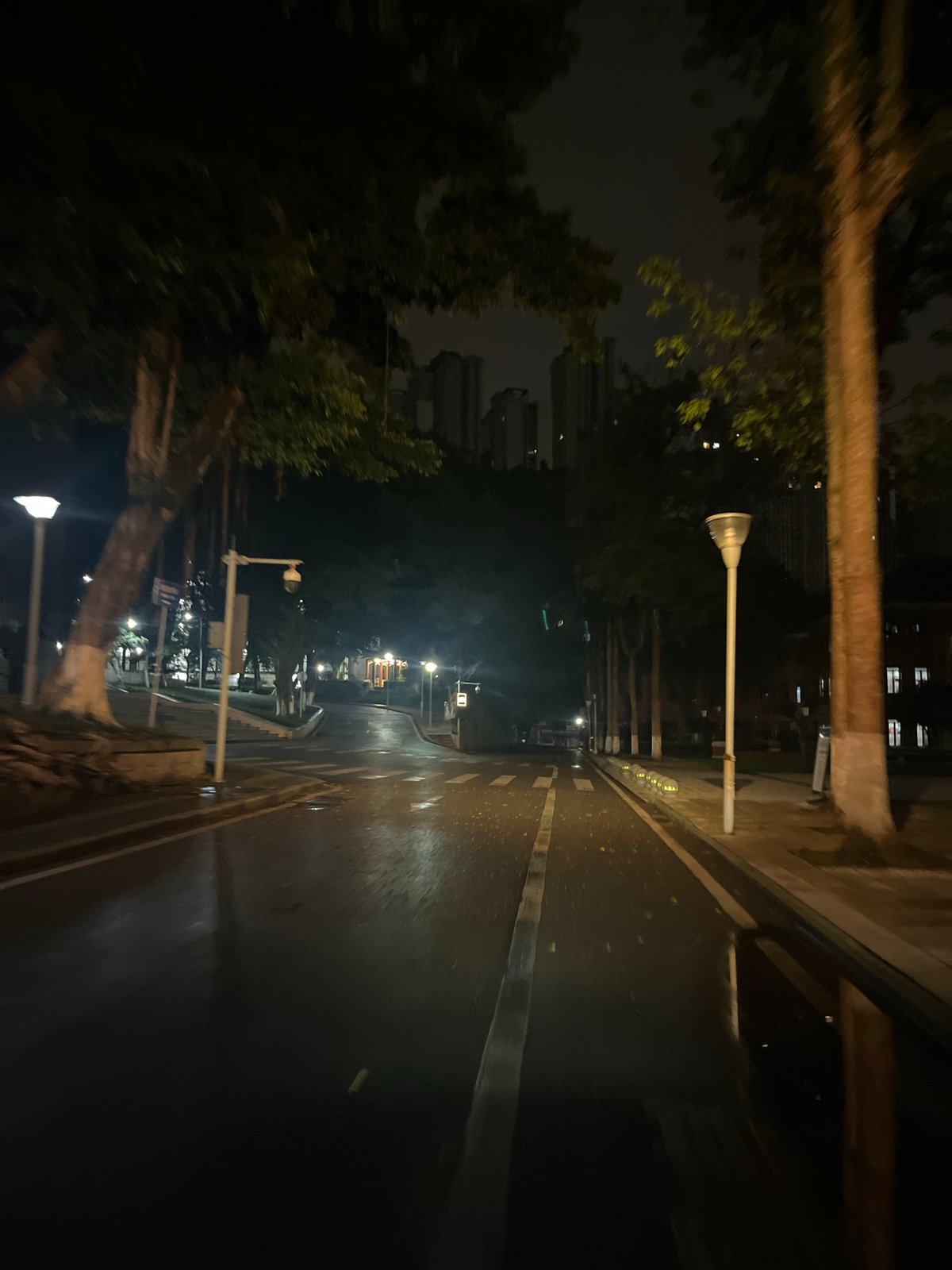 Witness documents wet evening streets across Chongqing districts