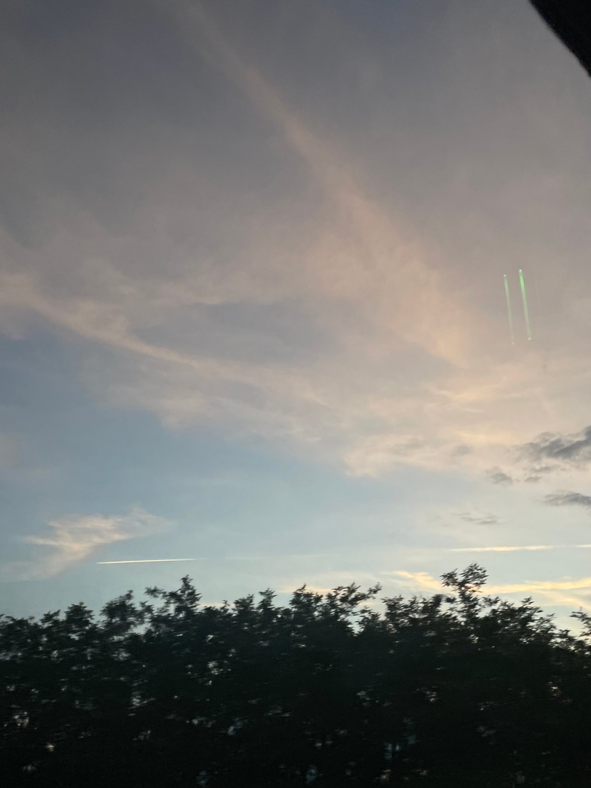 Aircraft contrail photographed over Ub Municipality, Serbia early morning