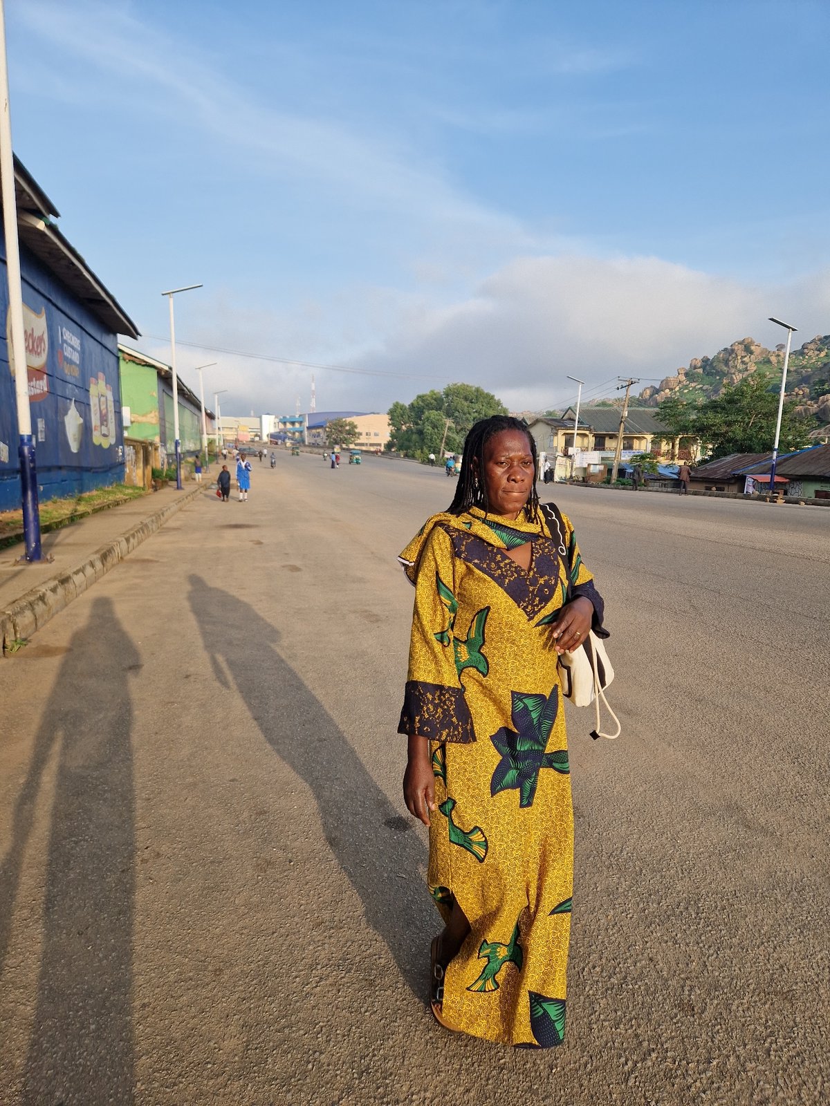Morning street life in Kabong: roadside frying, school runs, daily movement