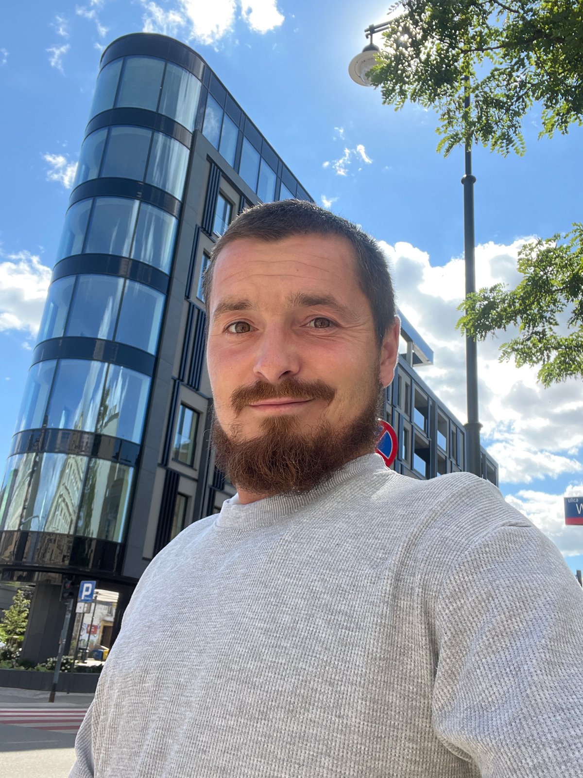 Selfie tour of Łódź's contrasting architecture on a sunny afternoon
