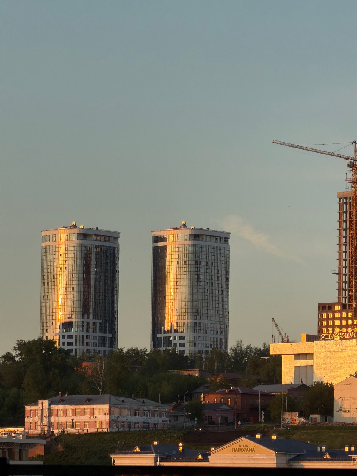 Sunset fairground ride captures cityscape views in Izhevsk, Russia