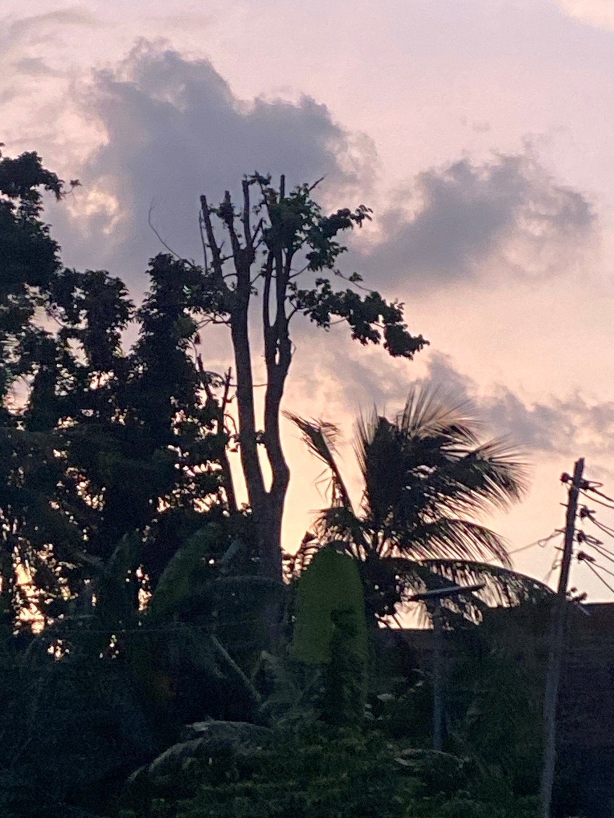 Twilight sky with layered clouds photographed in Achara, Nigeria