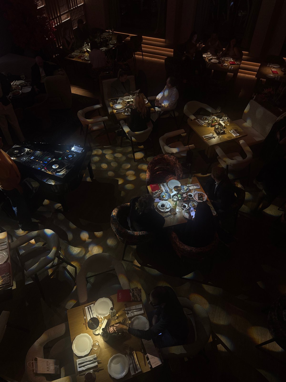 Evening dining scene captured at upscale Moscow restaurant