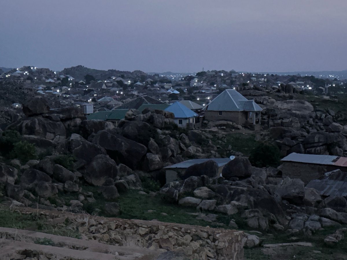Dawn documentation of Jos Nigeria's rocky residential hillside community