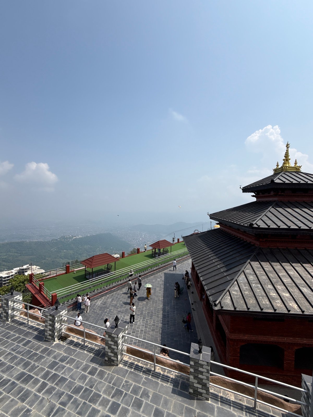 Morning temple visit captures golden Ganesha statues in Pokhara