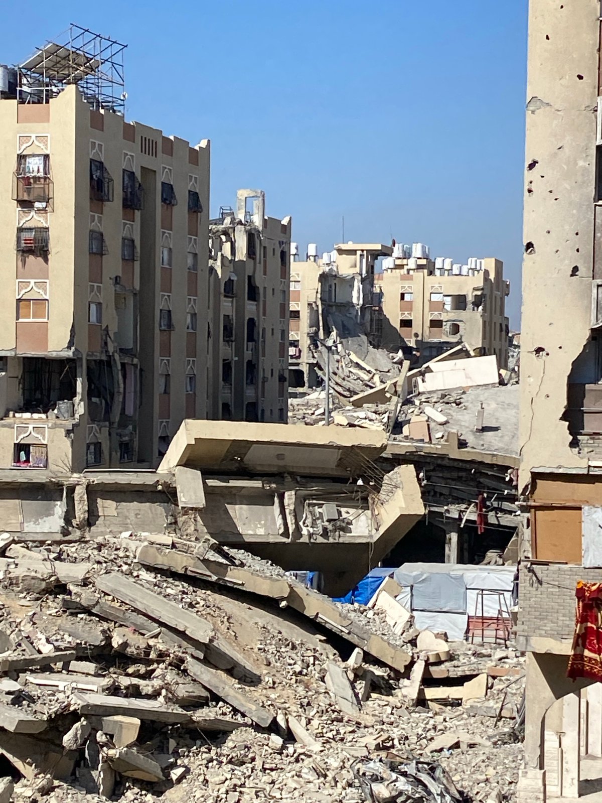 Extensive building damage documented in Khan Yunis morning hours