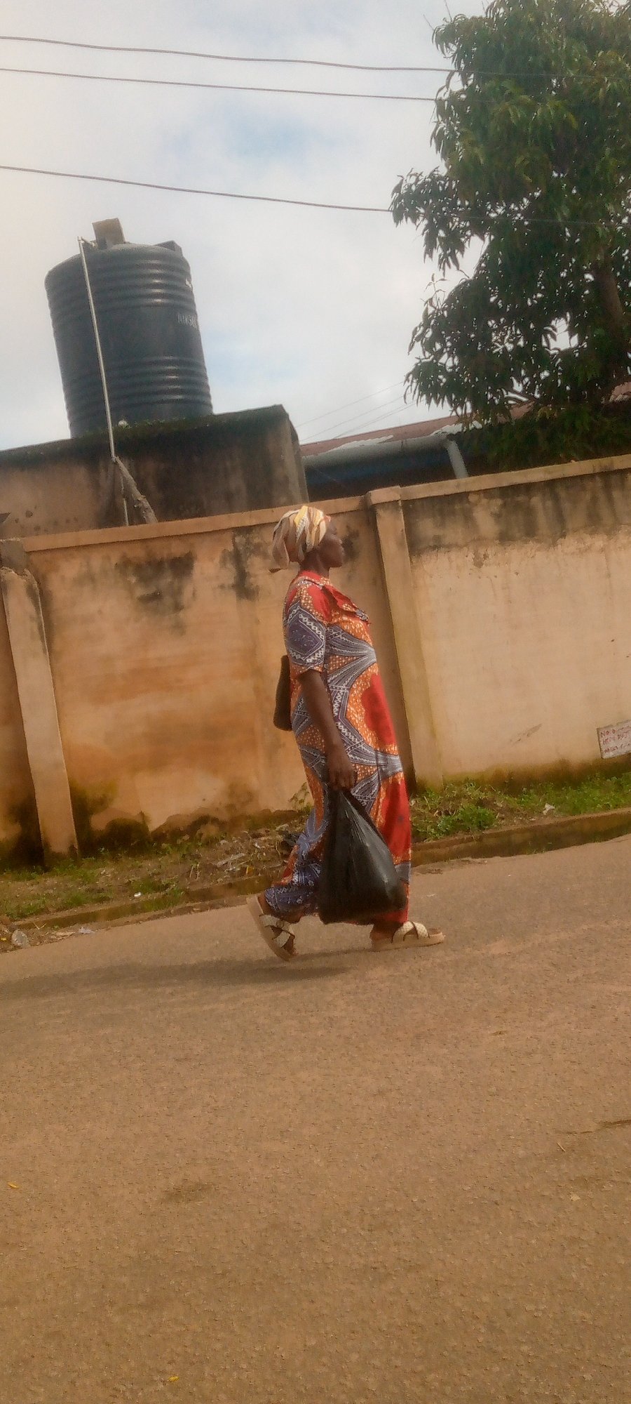 Morning foot traffic on the streets of Jos, Nigeria