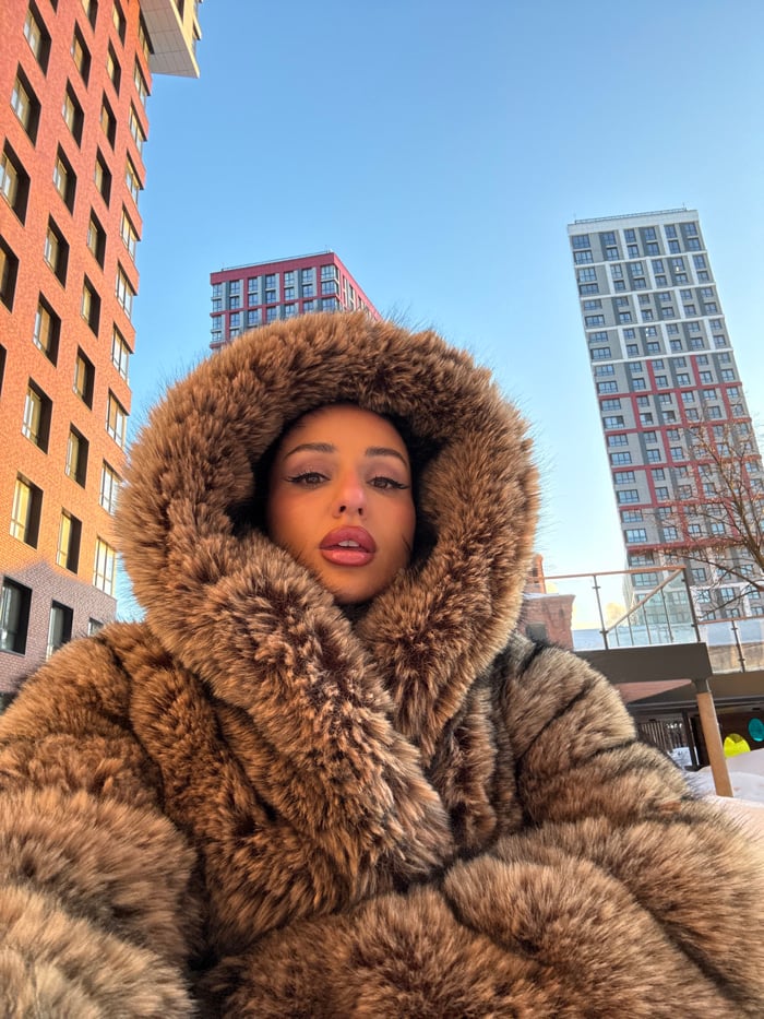 Woman takes selfie at Moscow residential complex