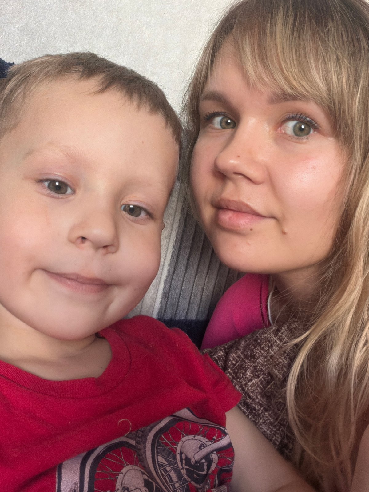 Two people captured in indoor selfie, April 25