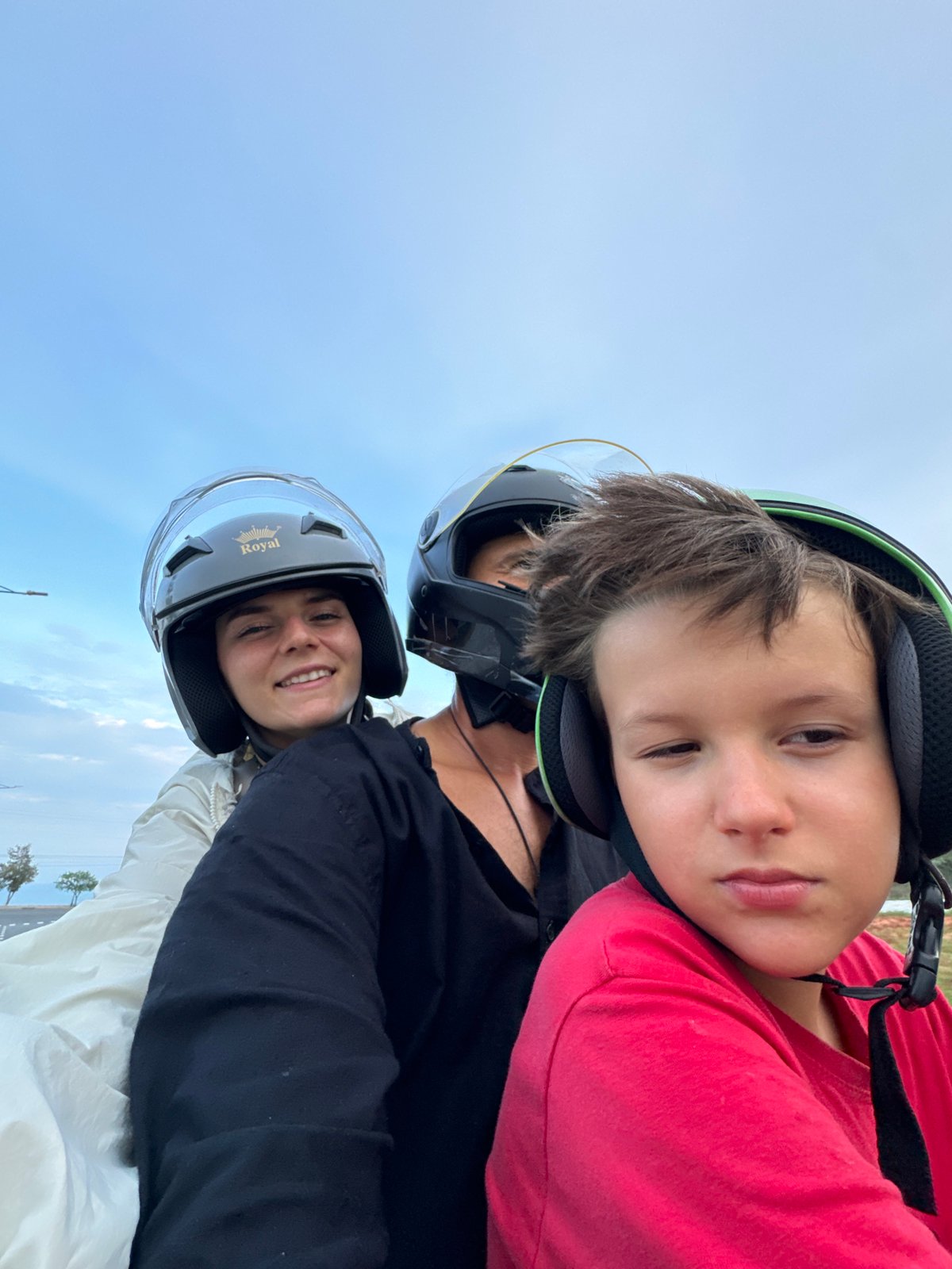 Helmet-wearing duo takes motorcycle selfies in Mũi Né