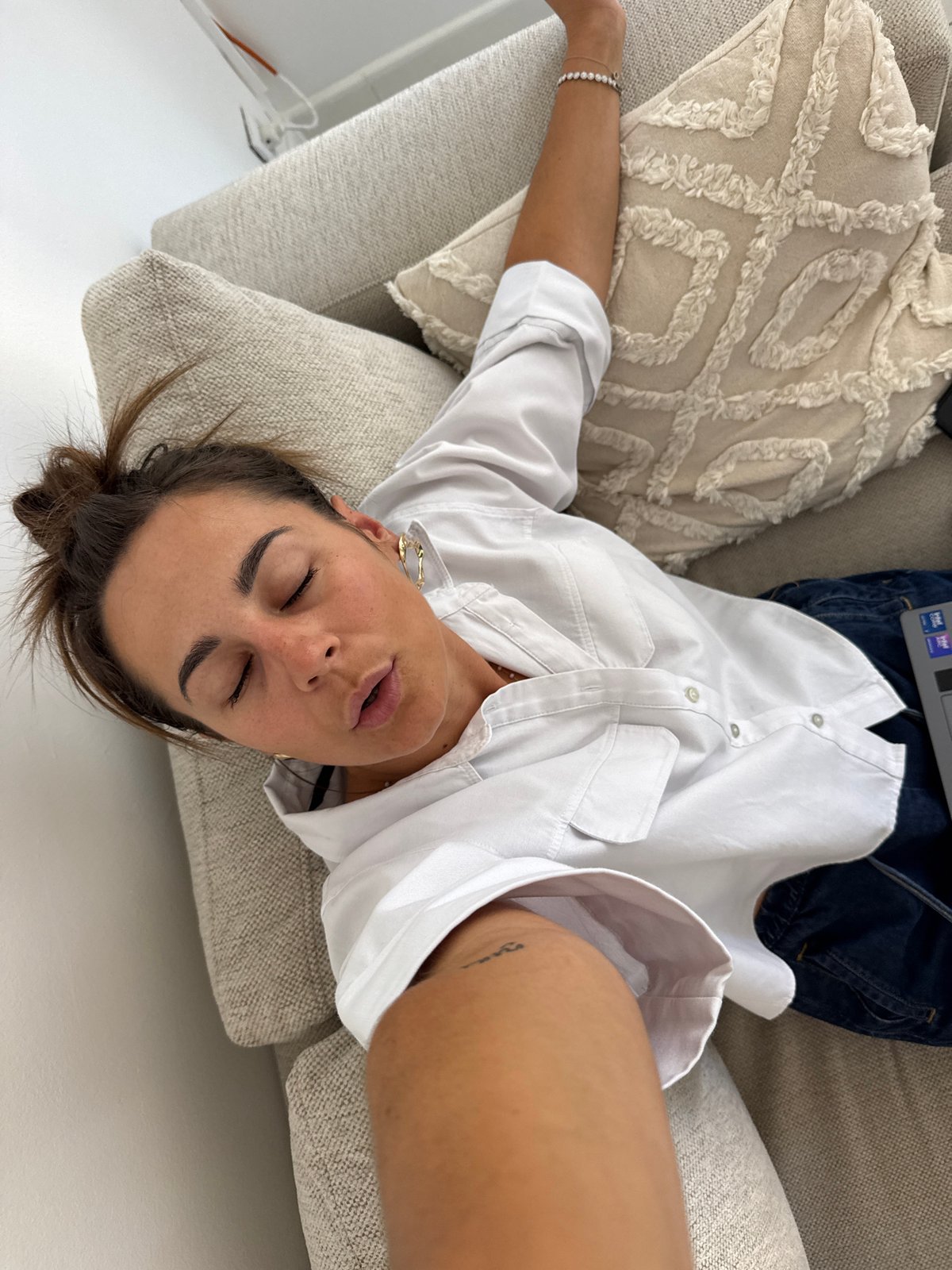 Woman photographed resting, sightseeing in Cannes during afternoon