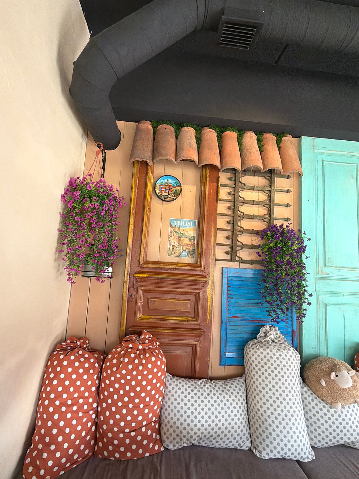 Empty Mediterranean cafe interior documented with rustic decor