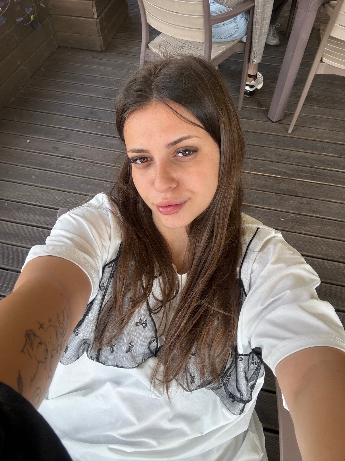Woman documents morning cafe visit with baby in Velingrad