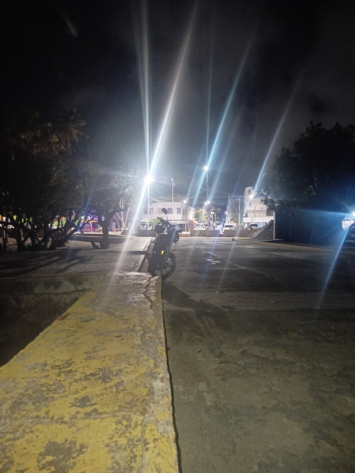 Nighttime waterfront scenes across Juan Griego, Venezuela
