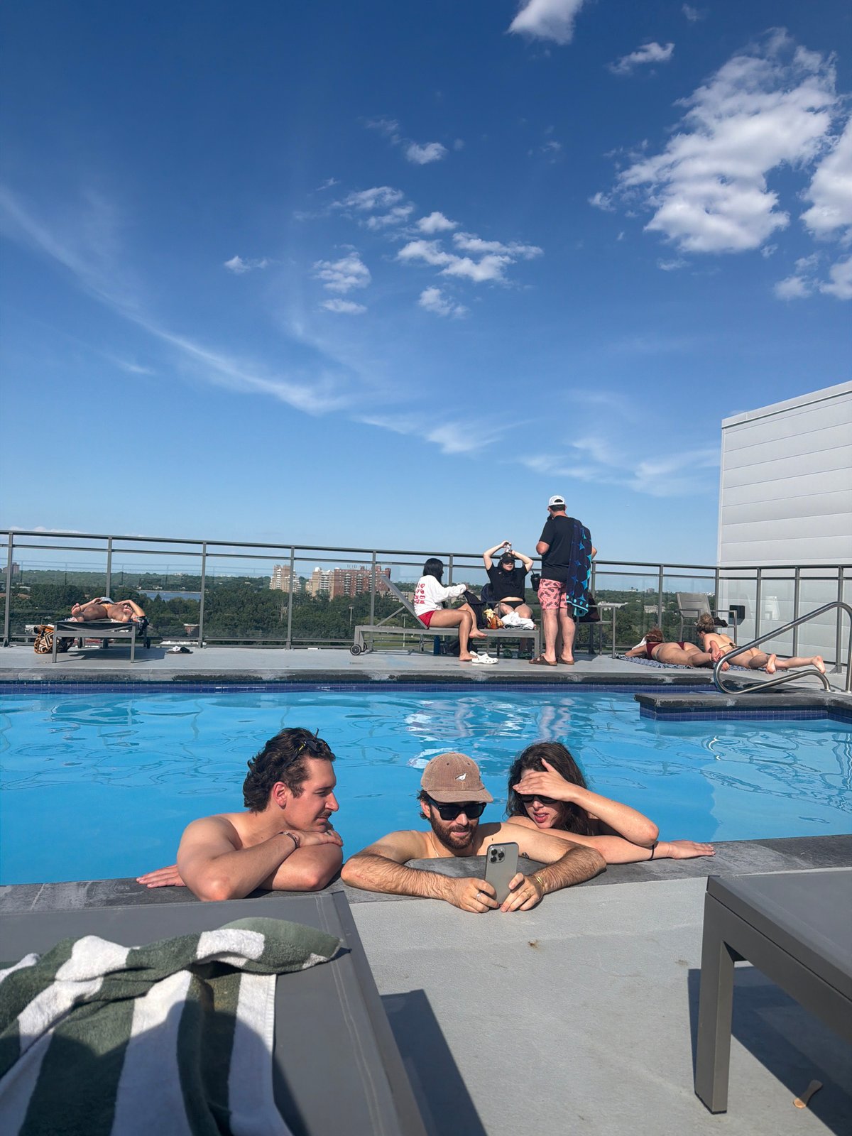 Rooftop pool hang in Laval on a sunny summer day