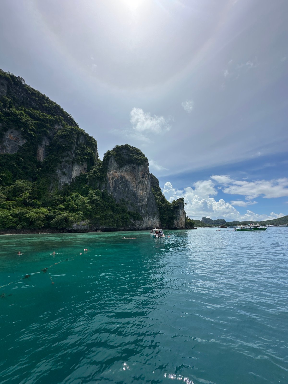 Karst coastline, calm seas, and a curious monkey at Ton Sai