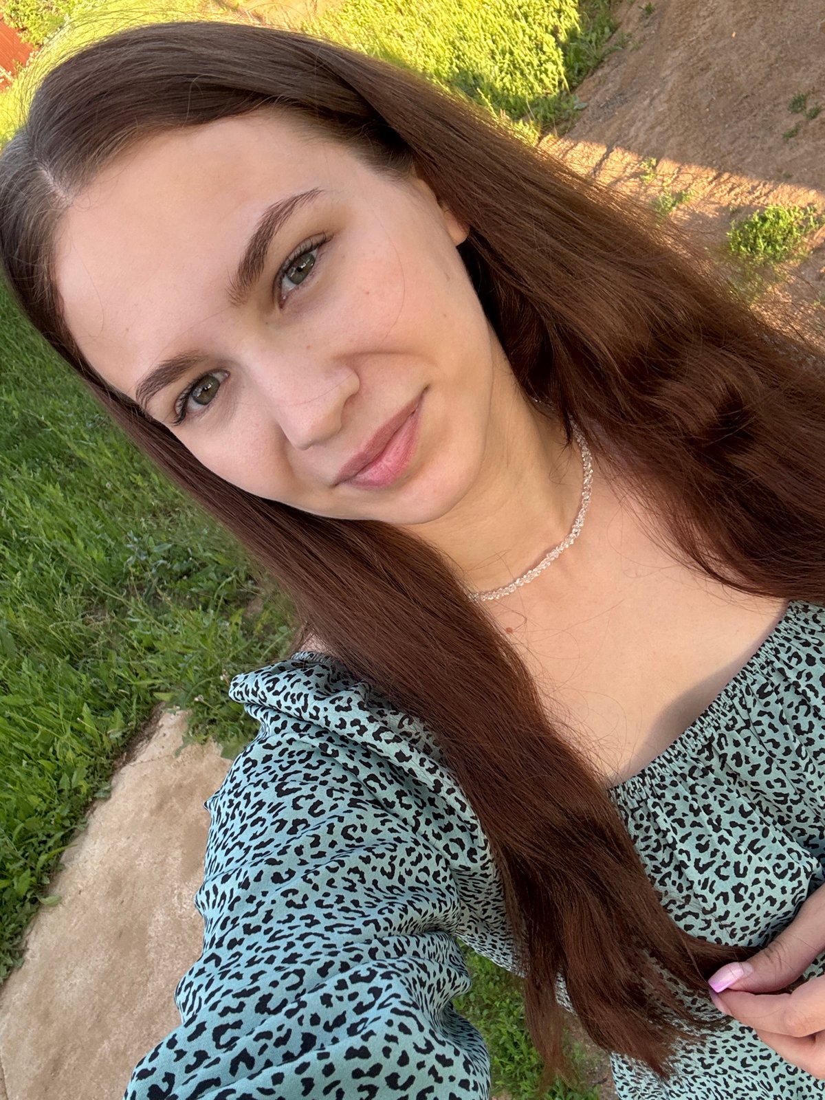Woman documents afternoon outing with selfies and nature photography