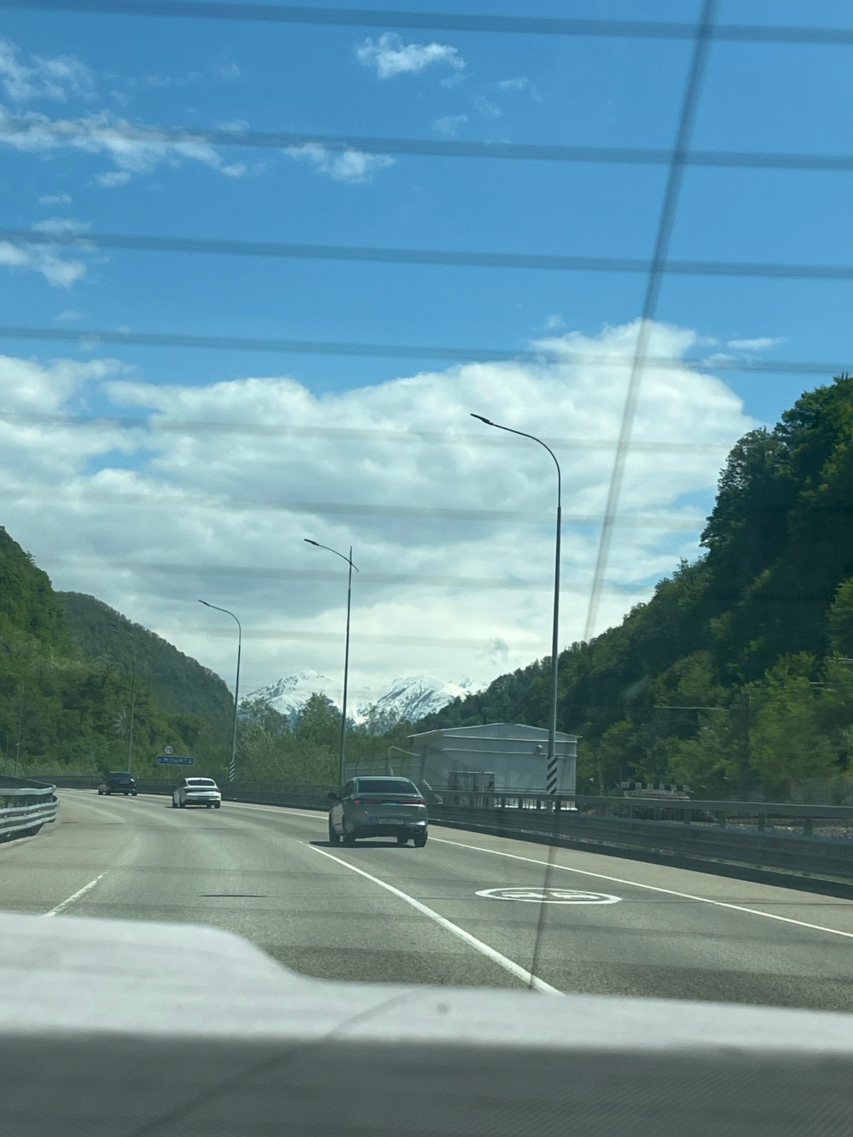 Traveler documents scenic mountain journey across multiple vehicles
