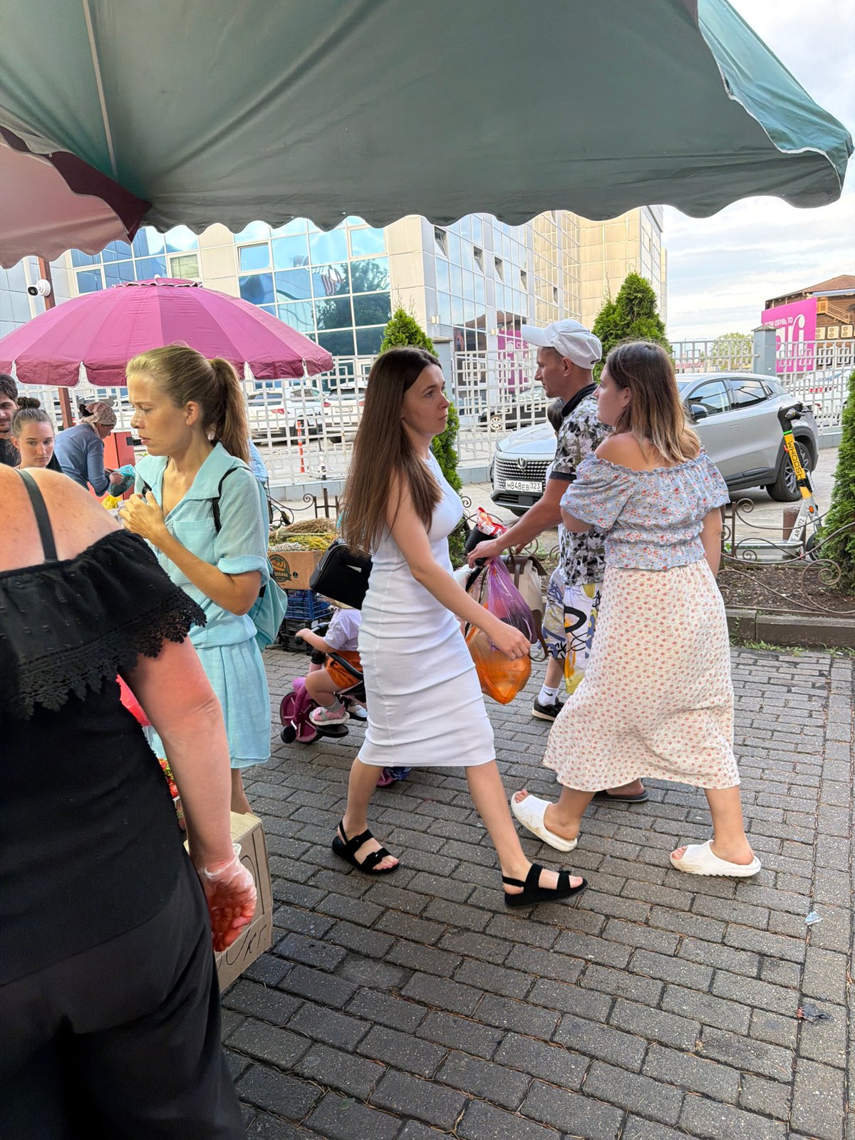 Afternoon street life and urban greenery in Sochi