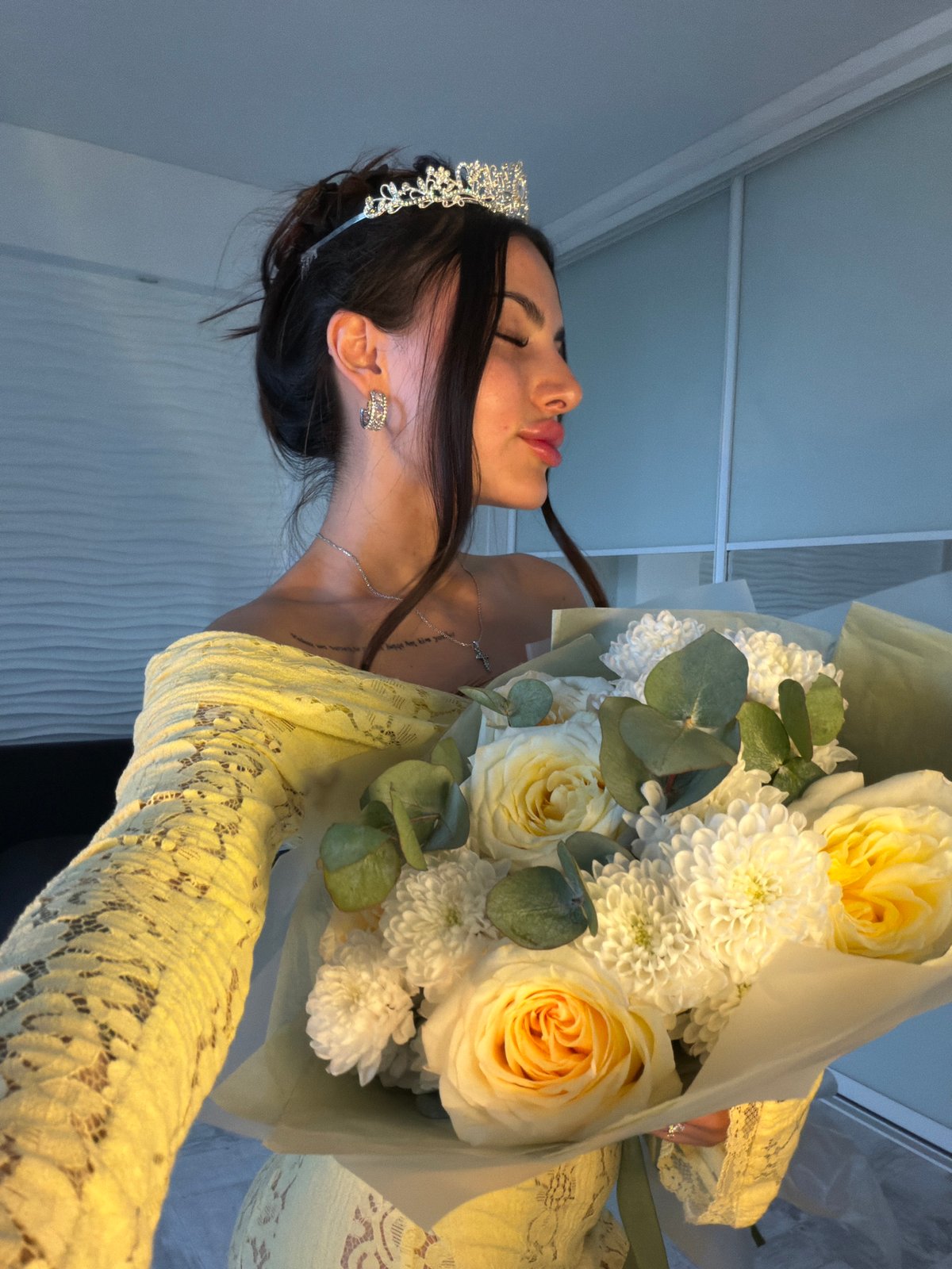 Tiara and bouquet at a formal celebration in Mahilyow