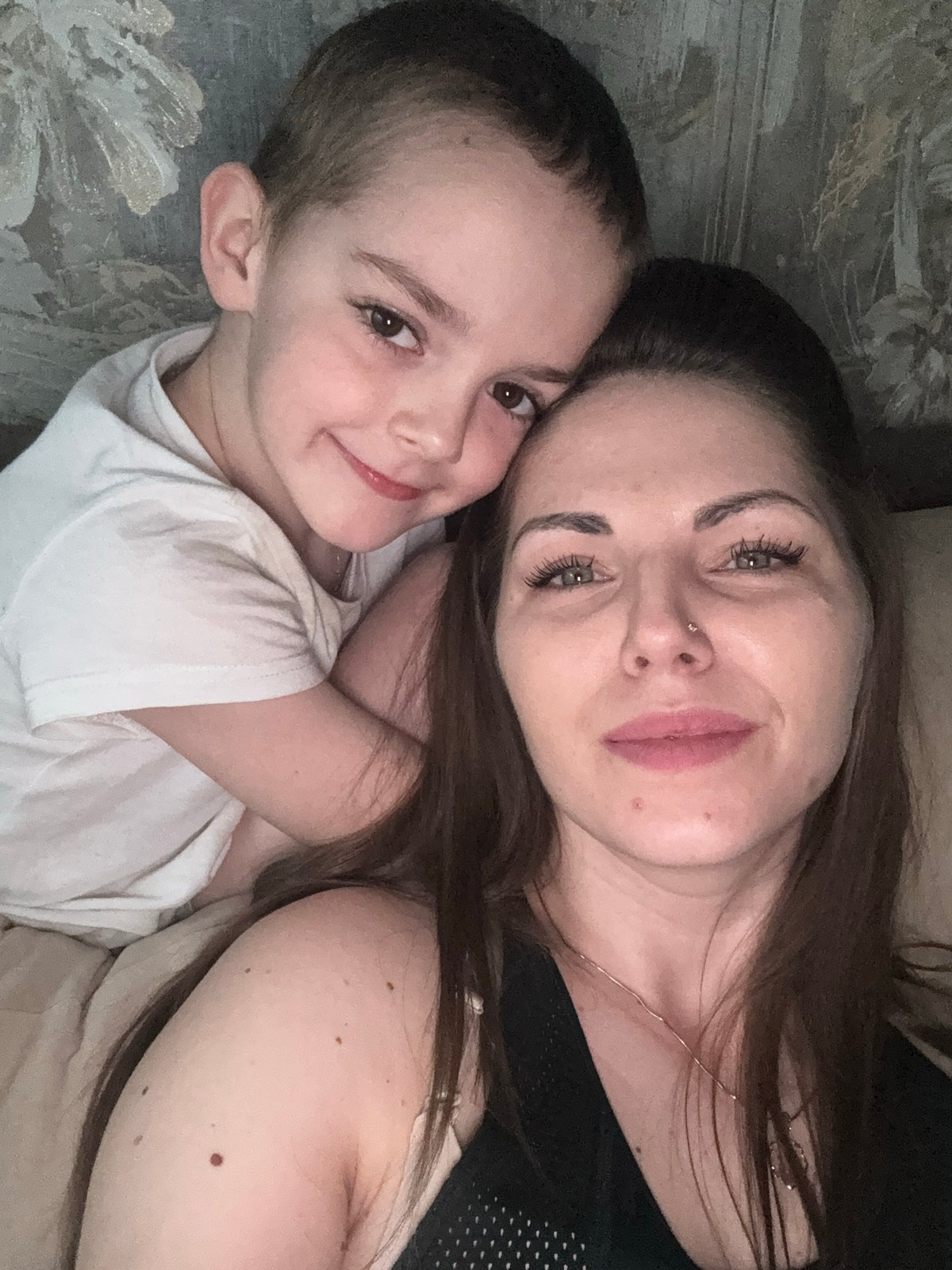 Mother and child share quiet moments in Russian village
