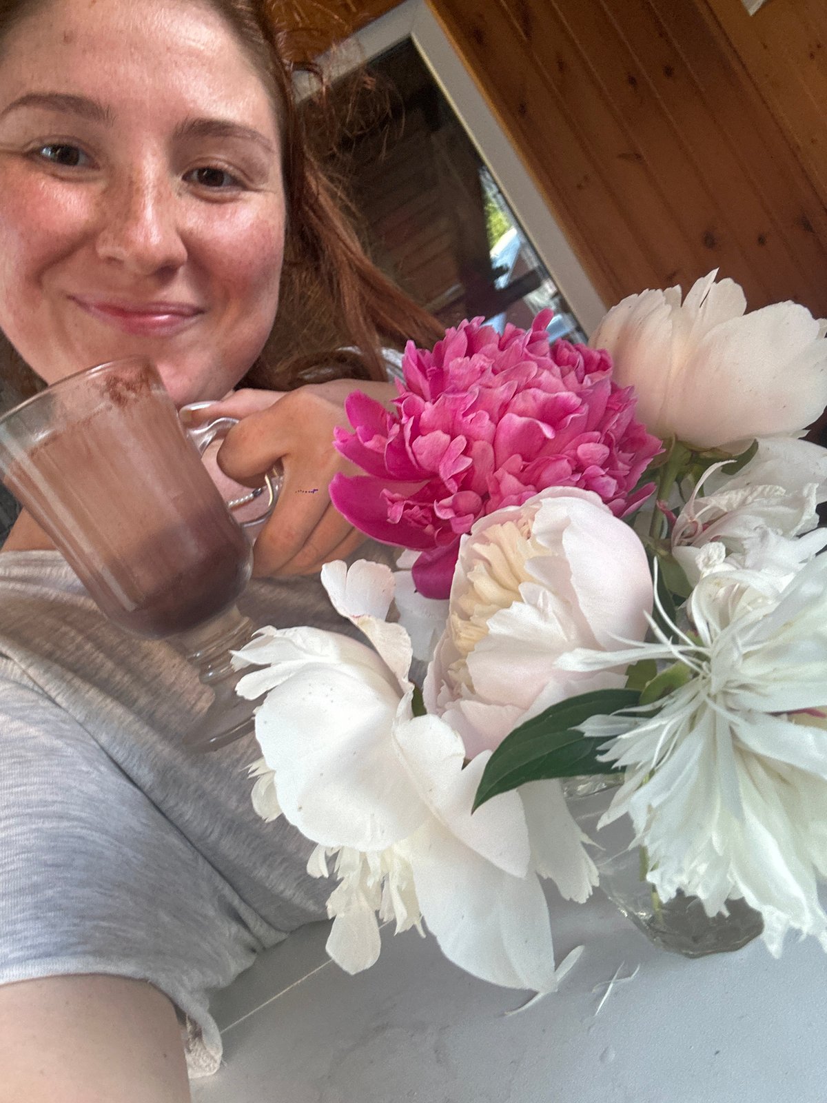 Hot chocolate and peonies at home in Nizhny Novgorod