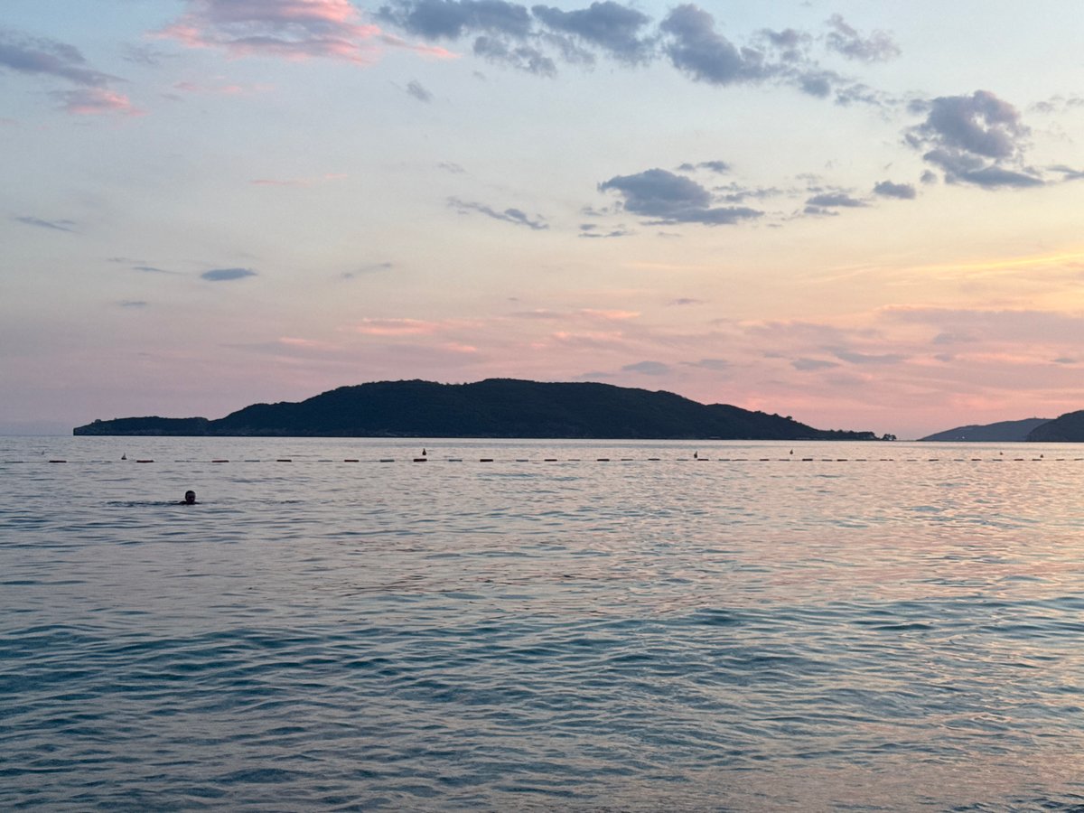 Kamenovo Beach at sunset — shoreline, locals, and golden light