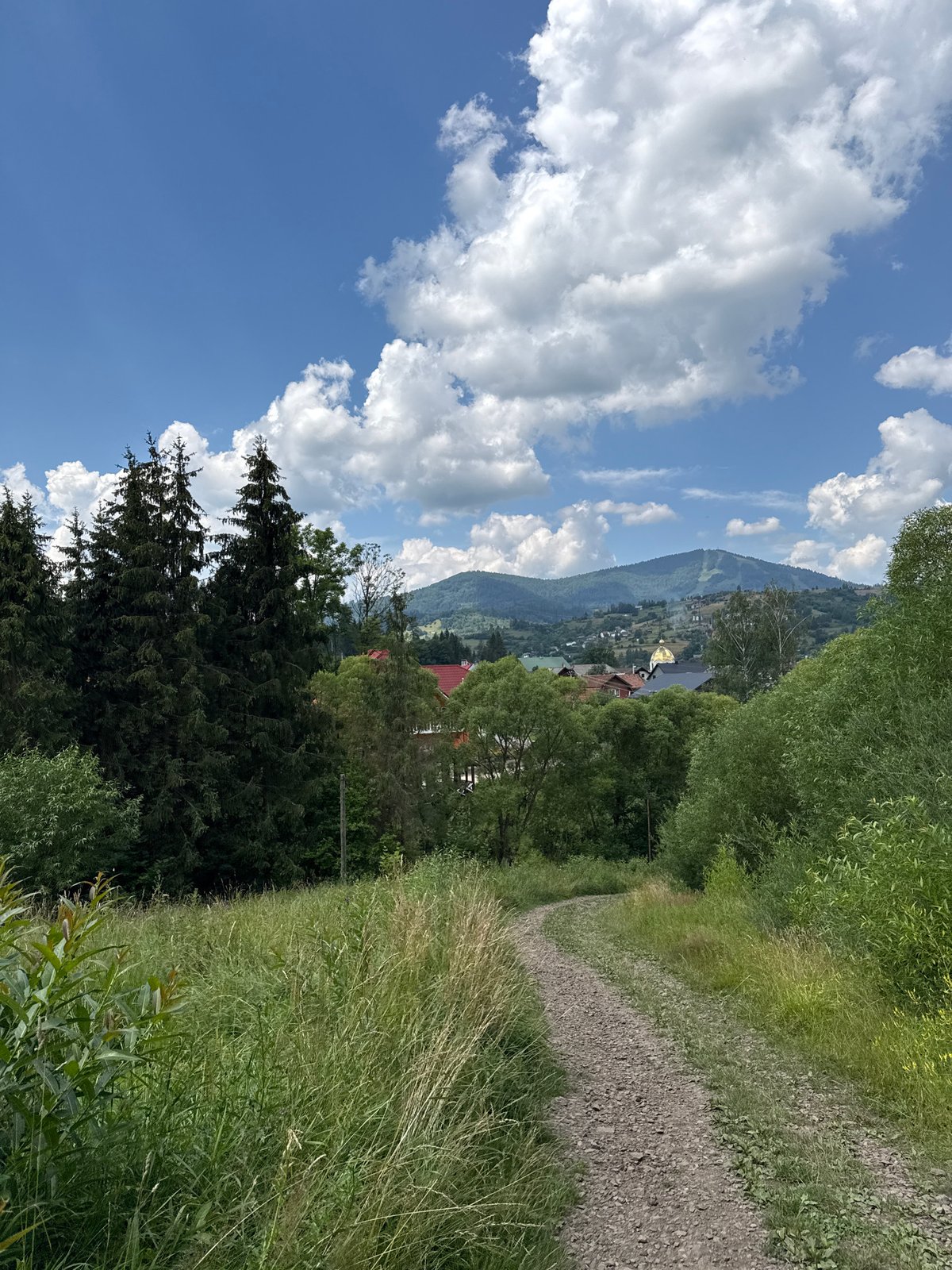 Morning in Slavsko: Carpathian village, river, and mountain scenery