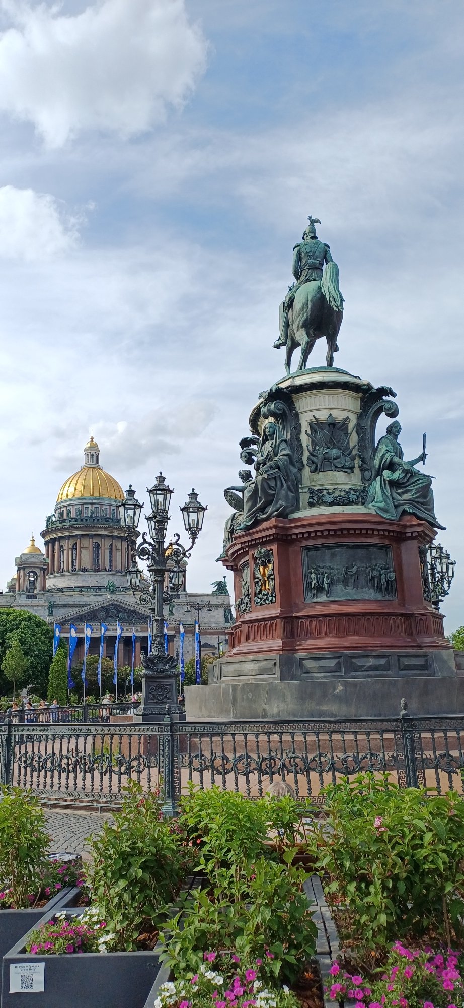 Visitor documents Saint Isaac's Cathedral and summer flower displays