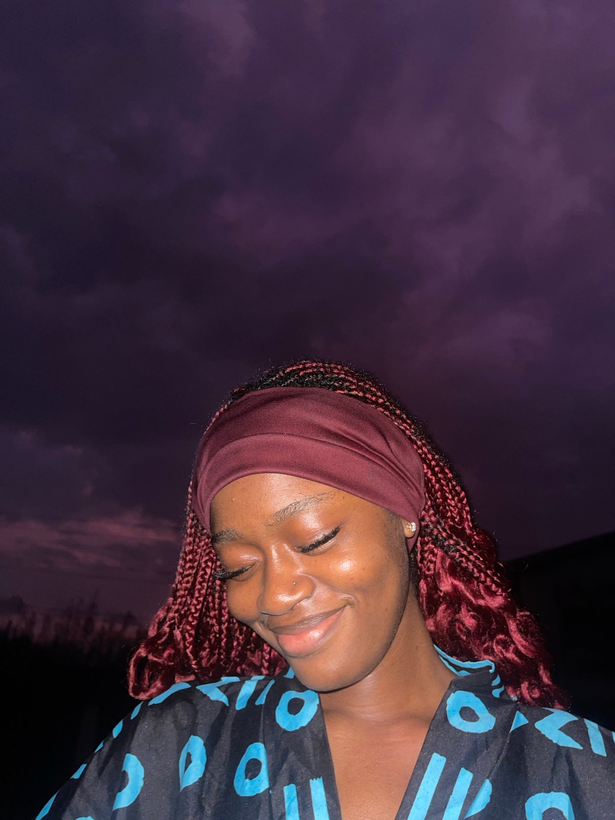 Dusk selfie session under a purple sky in Ado, Nigeria