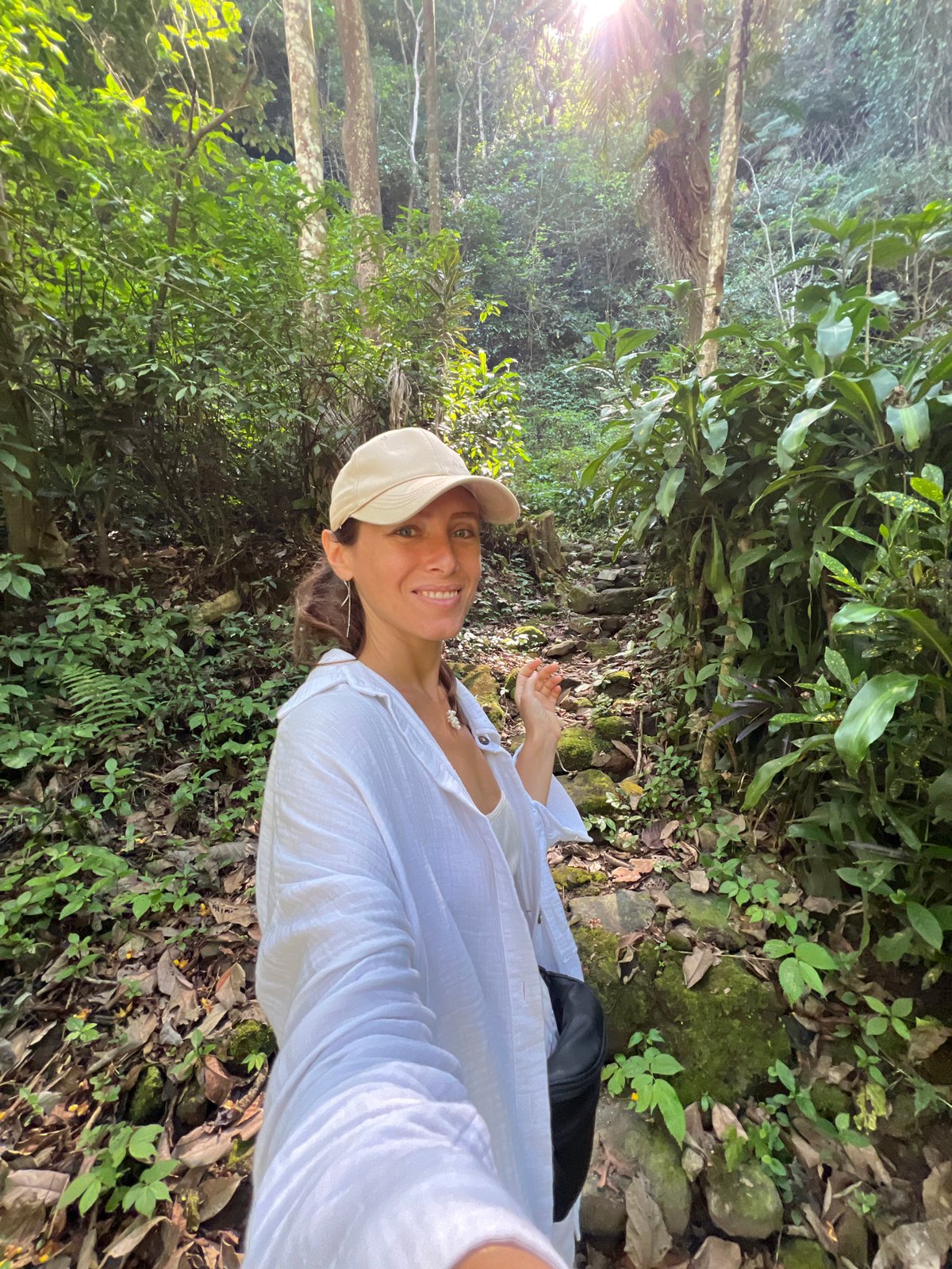 Morning waterfall exploration in Busungbiu with multiple visitors