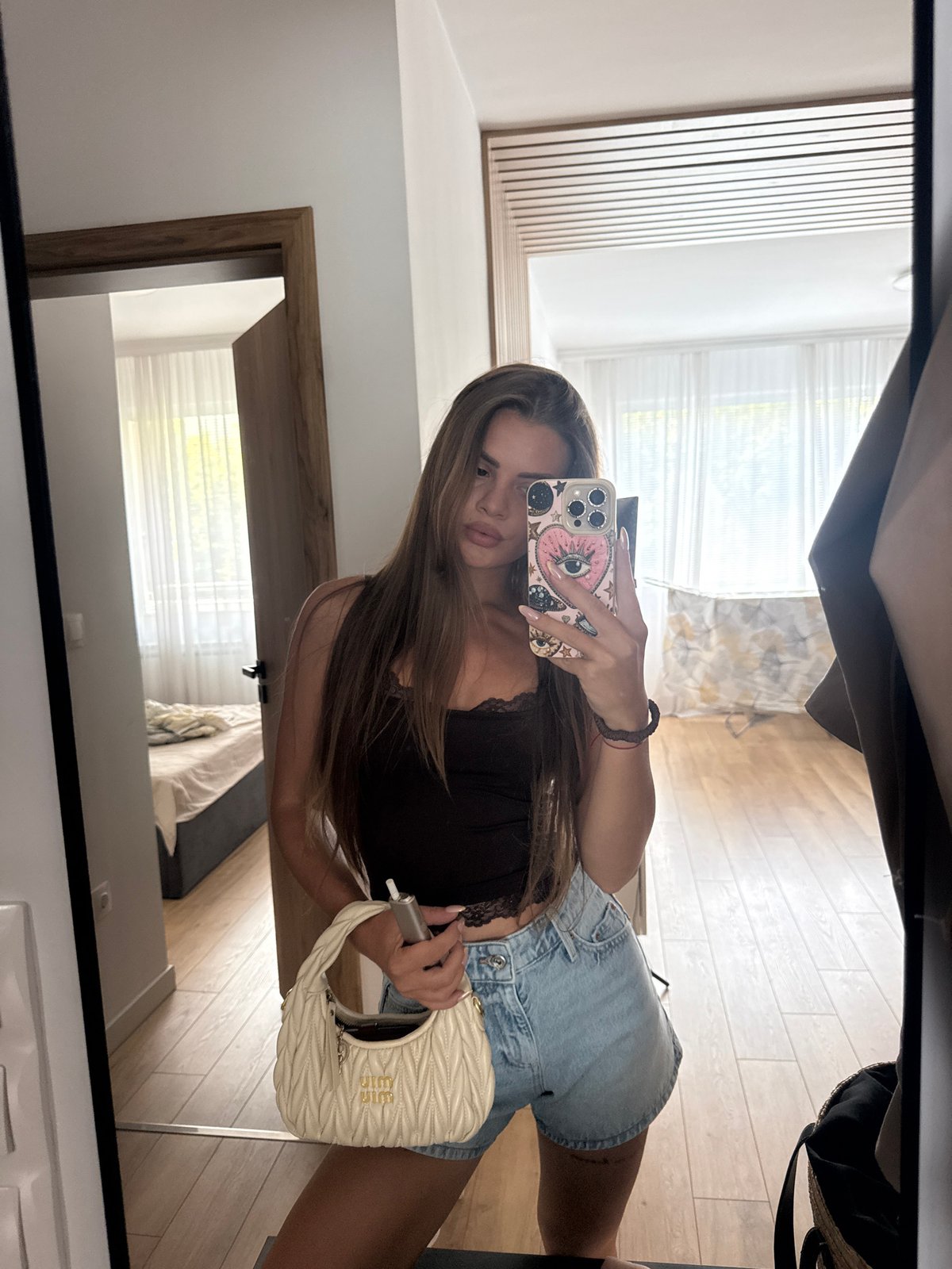 Mirror selfie moment in a Plovdiv bedroom, July 2026