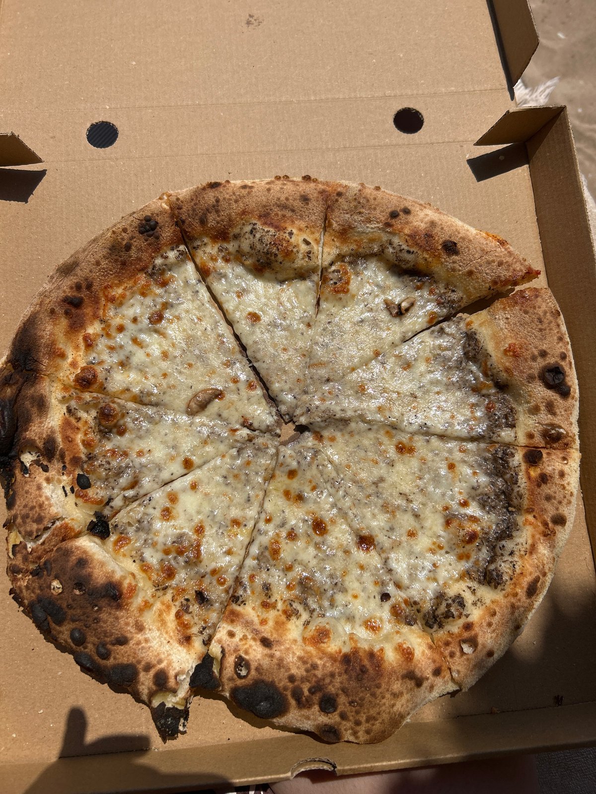 Beach day in Chernomorets: pizza, sun, and seaside streets